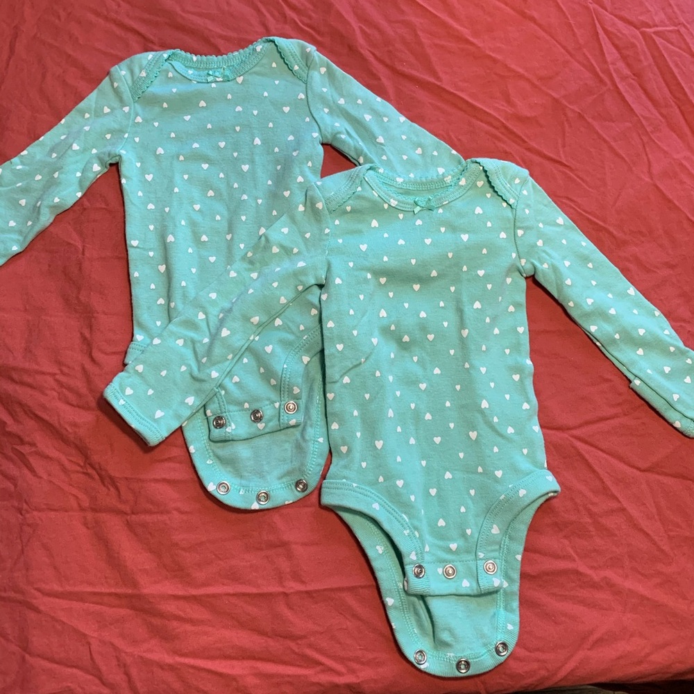 Two Carter’s newborn long sleeved onesie